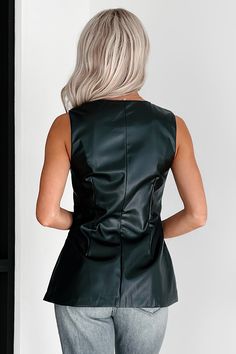 SELF: 55% POLYESTER, 45% PU. LINING: 97% POLYESTER, 3% SPANDEX Model Wearing Size Small Color: Black Faux Leather Material V-Neck Button Front Faux Pockets Side Slits Lined Vest Has Little Stretch 16.5" Armpit To Hemline For Model Size Specs Please Check Size Charts Launched: 10/17/24 Faux Leather Vest, Graphic Dress, Casual Night Out, Denim Coat Jacket, Basic Dress, Work Tops, Short Mini Dress, Leather Vest, Cutout Dress