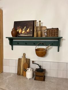 a shelf with pots, pans and other items on it