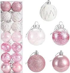 pink and white christmas ornaments in a box