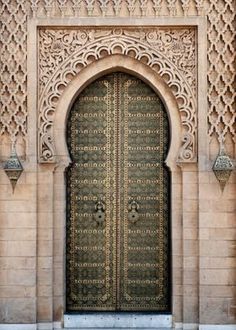 an ornate door with intricate carvings on it