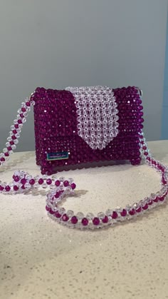 100% handmade beads bag. Great for a gift, going out to events or just evereday use. Cheap Beaded Shoulder Bag For Events, Casual Beaded Bags At Cheap Price, Luxury Beaded Shoulder Bag For Fashion, Purple Beaded Bags For Gifts, Purple Beaded Bag As Gift, Purple Beaded Bag For Gift, Luxury Beaded Clutch Shoulder Bag, Beaded Clutch Shoulder Bag As Gift, Beaded Clutch Shoulder Bag For Gifts