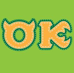 the word ok is made up of stitchs on a green background with an orange cat