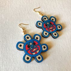 Hand painted PR flag on Taino Sol with gold jump rings & fishhooks.  - Taino Sol 2 inches - 3mm jump rings  - gold fishhooks  - hand painted PR Flag Pr Flag, Print On Paper Bags, Classy Earrings, Puerto Rico Flag, Cool Piercings, Beaded Earrings Patterns, Puerto Rican, Earring Patterns, Red Bead