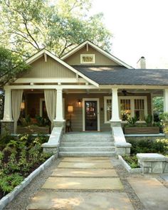 a house with steps leading up to the front door