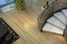 an aerial view of a spiral staircase in a home