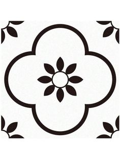 a black and white flower pattern on a wall