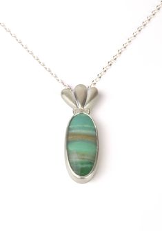 Silver & Stone Necklace - This pendant features a one of a kind opalized wood gemstone that mimics a landscape. The bezeled opalized wood dangles from a decorative cast component. The cast and fabricated elements are made from Argentium sterling silver and the chain and lobster clasp are sterling silver. <br><br>Available with a 16, 18, 20, or 22 chain. Oval Opal Necklace With Polished Finish, Stone Work, Oval Pendant, Turquoise Pendant, Metal Design, Stone Necklace, Metal Jewelry, Girly Things, Jewelry Necklaces