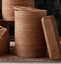 several woven baskets stacked on top of each other