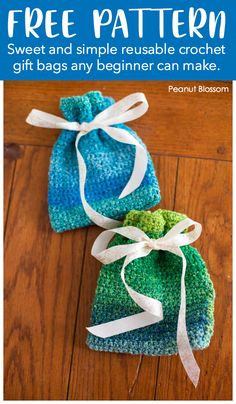 two crocheted bags sitting on top of a wooden floor next to each other