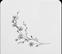 a black and white drawing of flowers on paper