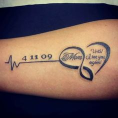 a tattoo on the arm with an arrow and heartbeat