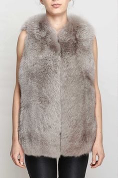 Crafted from super-soft fox fur, this gilet is the perfect winter layer for glamorous ladies. Fastened with a concealed hook-and-eye fastening, layer the plush piece over a long-sleeved dress and woolly tights for an adorable autumnal party ensemble, or with jeans and ankle boots for a casual stylish look Autumnal Party, Lux Fashion, Women Crafts, Winter Layering, Casual Stylish, Sleeved Dress, Vest Outfits, Western Outfits, Fox Fur