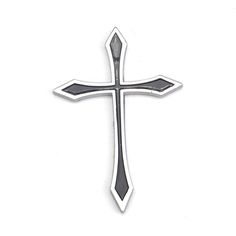 a metal cross on a white background