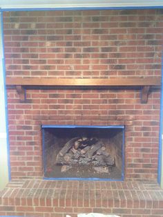 a fire place that is made out of bricks