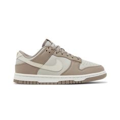 Comes Dressed In Multiple Hues, With Moon Fossil, Light Orewood Brown, Light Iron Ore, And Summit White Being The Main Colors. This Low Nike Dunk Has Overlays, Outsoles, Laces, As Well As Lining All In A Darker Shades Of Grey Than The Light Grey Used For The Base Of The Shoe. The Model Also Boasts Swooshes Marks In A Lighter Bone Hue That Creates A Few Minor Contrasts Displayed On Its Laterals. Dunk Low Moon Fossil, Iron Ore, Nike Shoes Women, Dunk Low, Nike Dunk, Shades Of Grey, Nike Dunks, Main Colors, Womens Shoes Sneakers