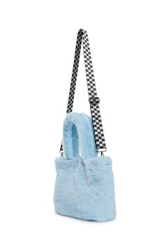 This set includes a fuzzy faux fur tote bag with an embroidered design of Julius’ face on the front, a top snap button closure, top handles, an all-over print lining of Julius’ face, a removable keychain featuring a vegan leather heart printed with Julius’ friend Skurvy, an enamel charm of Julius’ face and an enamel star, a removable and adjustable nylon shoulder strap with a checkered pattern, and a detachable nylon wallet with a graphic front print of ‘I Heart Julius,’ a velcro closure, matchi Trendy Shoulder Bag With Faux Fur Lining, Trendy Blue Shoulder Bag For Winter, Trendy Blue Bags For Winter, Trendy Blue Winter Bags, Blue Rectangular Bags For Winter, Blue Rectangular Winter Bags, Trendy Faux Fur Rectangular Shoulder Bag, Trendy Rectangular Faux Fur Shoulder Bag, Trendy Faux Fur Shoulder Bag