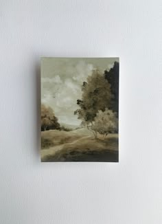 a painting hanging on the side of a wall