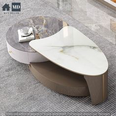 a marble coffee table sitting on top of a carpeted floor