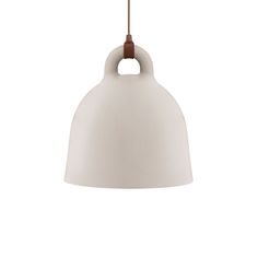 a white pendant light hanging from a brown cord on a white wall with a wooden handle