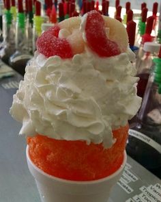 an ice cream sundae with fruit on top