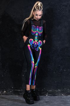 "Shine with all the colors in this skeleton overall. It has a snug high waist, elastic shoulder straps, side pockets, and full leggings cover. ► Material & Washing It's soft, warm, and stretchy. It consists of 80% Polyester, and 20% Elastane & feels like Cotton. > Give it a try, and you won't want to take it off. ► Colors The fabric dyes are remarkably vivid, so I must warn you that you will stand out in the crowd! There is no fading or fabric pattern cracking when the material is stretched, eve Skeleton Overalls, Rainbow Skeleton, Plus Size Overalls, Plus Size Rave, Clothing Kawaii, Diy Couples Costumes, Womens Overalls, Sculptural Fashion, Goth Clothing