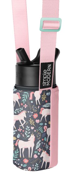 a pink and black cup holder with unicorns on the front, straps hanging from it