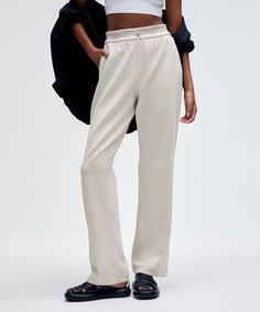 Feel It To Believe It. These Pants Have A Peach-Fuzz Touch That Is Impossible To Resist. Dress Them Up Or Down, And Enjoy The Softness All Day. Designed For Casual. An Easy Fit That Floats Away From Your Body:falls Straight Down From Hip To Hem:31" Inseam, Intended To Sit Below The Ankle For Heights Of 55"-58". Front Pockets With Interior Card Sleeve. Shockcord At The Waist To Customize Fit. | Softstreme High-Rise Pant Regular Lululemon Full-length Bottoms With Elastic Waistband, Lululemon Relaxed Fit Full Length Pants, Casual Full Length Lululemon Pants, Casual Full-length Lululemon Pants, Lululemon Casual Full-length Pants, Lululemon Relaxed Fit Full Length Bottoms, Lululemon Wide Leg Pants With Elastic Waistband, Lululemon Wide-leg Pants With Elastic Waistband, Lululemon Bottoms With Elastic Waistband And Straight Leg