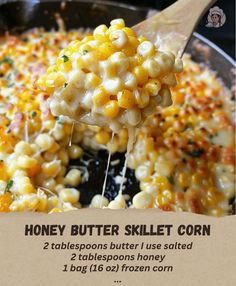 a wooden spoon with some corn on it and the words honey butter skillet corn