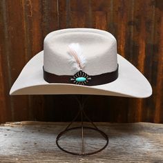 Saddle up in western style with Charlie 1 Horse's Silverbelly hat! Feel confident and fierce in this high-quality, handcrafted accessory. Complete your look and stand out from the crowd with this must-have hat that will never go out of style. Additional Information: PLU: HTC-CWSDUP-9540 Brand: CHARLIE 1 HORSE Southwestern Wide Brim Felt Hat For Western-themed Events, Western Adjustable Hats For Kentucky Derby, Southwestern Fitted Hats For Rodeo, Southwestern Style Short Brim Felt Hat For Western Events, Southwestern Felt Hat With Short Brim For Western-themed Events, Western Felt Hat For Rodeo, Western Style Felt Hat For Rodeo, Western Hat With Flat Crown For Festivals, Southwestern Curved Brim Felt Hat For Country Events