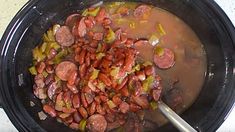 the food is being cooked in the slow cooker