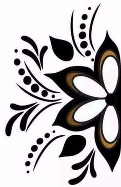 a black and white flower design with dots on it's petals, is shown