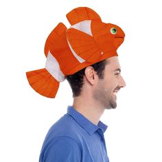 PRICES MAY VARY. This Super Cute Clown Fish Hat is Just What You Need at any Under the Sea Celebration This Hat Has an Adorable Personality and is a Great Accessory for any Adult Fun Party Costume This Clown Fish Hat is the Perfect Accessory for any Luau, Tropical, Hawaiian, or Beach Themed Party This Orange Plush Clownfish Novelty Hat Featuring a Full Length Fish with Giant Eyes and White Stripes is a must for a Deep Sea Adventure This Comfortable Fishy Hat is 11" Wide x 9 1/2" High There is something fishy about this hat! This adorable plush clown fish is a humorous hat that sits comfortably on the head. This tropical fish with its' bright orange body and white with black stripes will make any under the sea party complete. You won't want to hide this costume in an anemone. This adult siz Simple Fish Costume, Diy Fish Costume, Fish Costumes, Fish Hat, Seafood Party, Fish Costume, Sea Adventure, Novelty Hats, Cute Clown