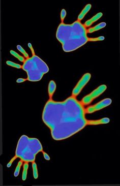 an image of two hand prints on a black background