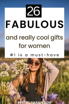 a woman standing in a field with the words, 26 fabulous and really cool gifts for women