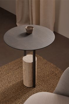 a small table with a bowl on it