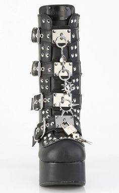 Buckles and studs and keys and locks, oh my! The Charade 118 buckle boots feature weapons, skulls, and studs. Lock in these babies. Vegan Black PU Leather 4 1/2 inch heel 2 inch platform Inner Side Zip Closure Featuring 4 Buckle Strap W/ Silver Chrome Plated Metal Plates at Center and Hanging Skull, Spiked Ball, Skiped O-Ring & Lock Charms Details Hanging From Plates Overall Cone Spike Stud Details U.S sizing-refer to size chart for more info Pleaser High Heels, Mary Janes Flats, Couture Heels, Alternative Shoes, Goth Boots, Gothic Boots, Vegan Leather Boots, Gothic Shoes, Metal Plates