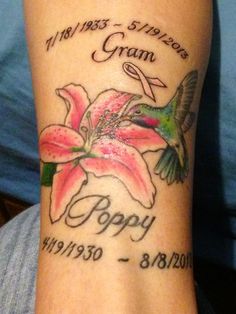 a woman with a tattoo on her arm has a pink flower and the words poppy written in cursive writing