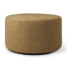 a round ottoman that is made out of brown fabric and has a black metal ring on the top