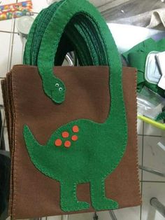 there is a bag with a dinosaur on it