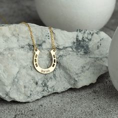 💎 This very cute and adorable horseshoe necklace will bring you luck. 💎 Take it as a lucky necklace by printing a name on it. 💎 Or give them a chance gift by printing the name of your loved ones. 💎 If you want, carry your feelings close to your heart by printing the name of your horse. 💎 A great gift for Mother's Day. 💎 A great gift for horse lovers. 💎 It is handcrafted from 925 sterling high quality silver. 💎TECHNICAL INFORMATION💎 - Pendant height: 15 mm - Pendant width: 15 mm - Chain Elegant Necklace With Horse Design As A Gift, Elegant Gold Horseshoe Necklace, Gold Horseshoe Necklace For Gift, Horse Shoe Necklace, Horse Design Pendant Necklace As Gift, Lucky Necklace, Ring Holder Necklace, Elegant Horseshoe-shaped Horse Design Jewelry, Personalized Wedding Rings