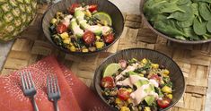 three bowls filled with food sitting on top of a wooden table next to pineapples