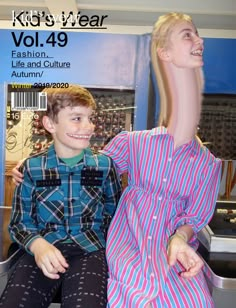 a young boy sitting next to a dummy in front of a blue wall with the words kids wear vol 49 written on it