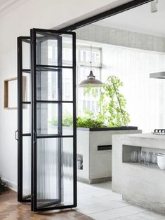 an open door leading into a kitchen area