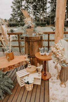 an outdoor area with wooden tables and chairs