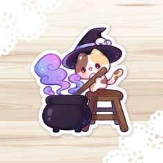 a sticker with an image of a cat in a witches hat sitting on a stool