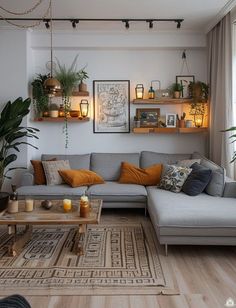 a living room filled with furniture and lots of plants