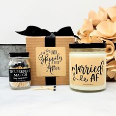 the wedding gift is next to a candle and some matches