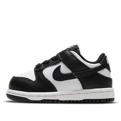 Best gifts for newborns/babies! The Nike Dunk Low TD Black White is a toddlers shoe that features a classic black and white colorway. It is made with leather and has a white base with black overlays. The Swoosh branding is black, and the shoe has a lightly padded nylon tongue. The tooling is two-toned, with a rubber outsole that draws from the Air Jordan 1 for traction. (SNKR/Skate/Light/Low Top) Baby Boy Shoes Nike, Baby Jordan Shoes, Black Skate Shoes, Nike Kids Shoes, Nike Shoes For Boys, Toddler Nike Shoes, Gifts For Newborns, Baby Jordans, Baby Nike