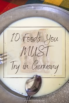 a sign that says 10 foods you must try in germany on top of a plate