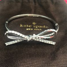 Authentic Brand New In Original Kate Spade Bag! Iconic Bow Hinged Bangle - Nsilver With Clear Crystals - Perfect Condition - Never Worn Kate Spade Bangle Bracelet As Gift, Kate Spade Bangle Bracelet For Weddings, Kate Spade Formal Bangle Bracelet, Kate Spade Bangle Jewelry Gift, Silver Kate Spade Bangle Bracelet, Ribbon Bracelet, Ribbon Bracelets, Bangle Silver, Spade Jewelry